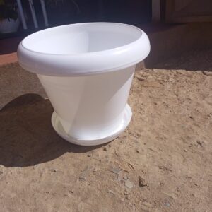 This 14-litre plastic plant pot is perfect for medium-sized plants, offering a sleek design and practical features for both indoor and outdoor use. Each pot includes a matching drainage plate to help manage water runoff and protect your floors or surfaces. Crafted from high-quality plastic, it's lightweight yet sturdy, and comes in elegant color options—white, brown, and maroon—to complement any home, balcony, or garden space. Key Features: 14-litre capacity, ideal for medium-sized plants Comes with a drainage plate to prevent overwatering Durable, easy-to-clean plastic Available in White, Brown, and Maroon Suitable for both live and artificial plants Dimensions (Approx): Height: 28–30 cm Diameter: 25–27 cm Capacity: 14 Litres Perfect For: Home & balcony gardening Office or reception décor Use with live or faux plants Medium indoor trees, herbs, or flowering plants