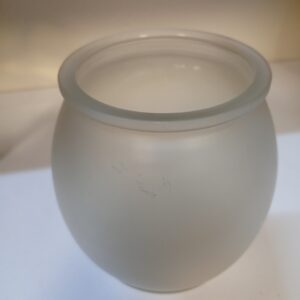 frosted globe-like glass vase priced at Ksh 500