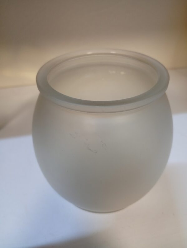 frosted globe-like glass vase priced at Ksh 500